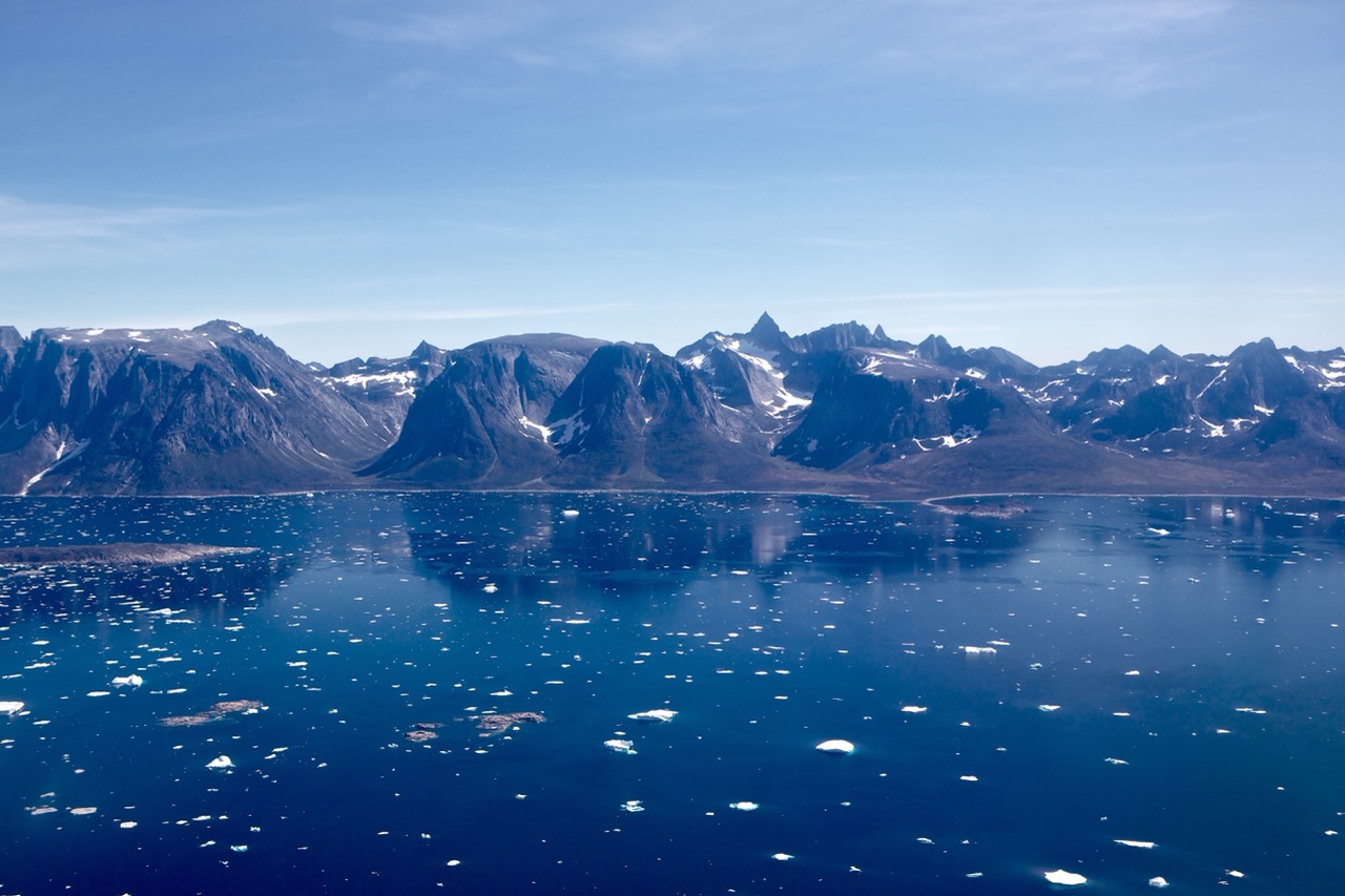 Ice fjord and mountains aerial photo